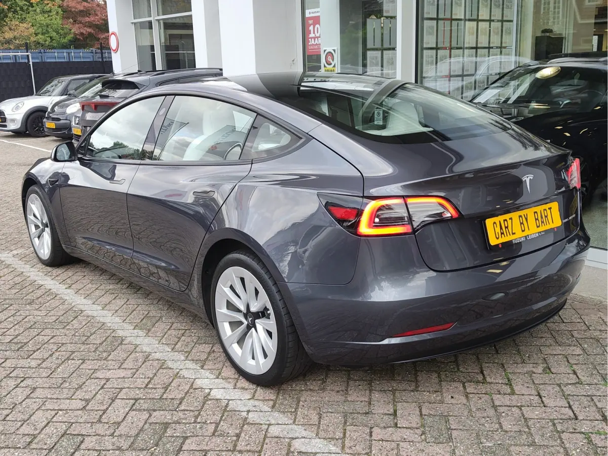 PREMIUM LONG RANGE AWD 78 kWh Wit Leder | FSD 3 | Camera | Pano | Stoelverwarming