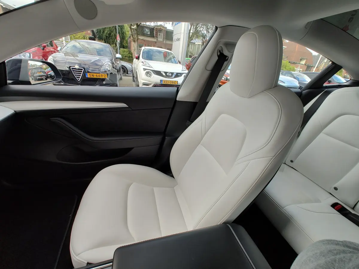 PREMIUM LONG RANGE AWD 78 kWh Wit Leder | FSD 3 | Camera | Pano | Stoelverwarming