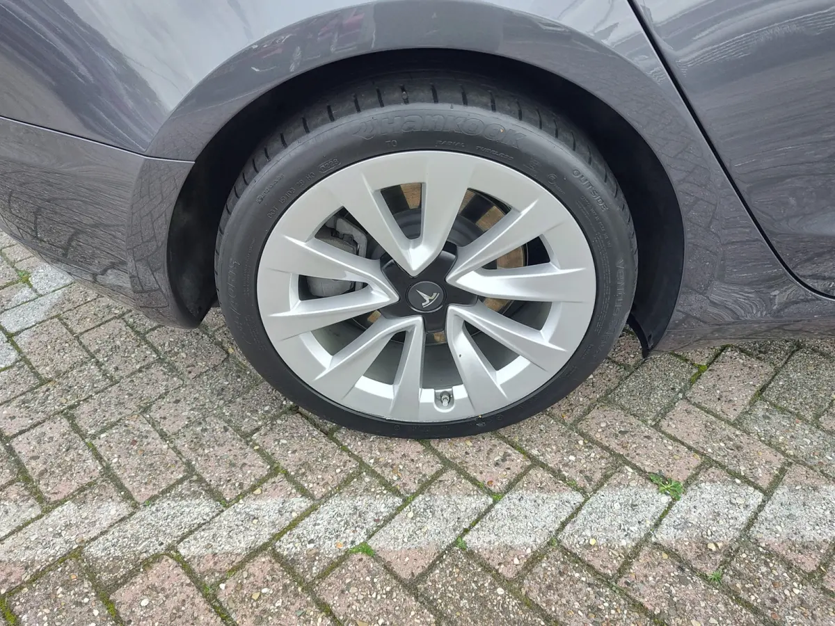 PREMIUM LONG RANGE AWD 78 kWh Wit Leder | FSD 3 | Camera | Pano | Stoelverwarming
