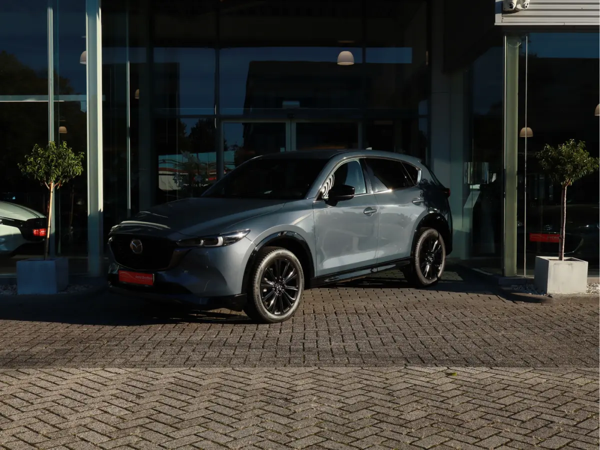 2.0 e-SkyActiv-G M Hybrid 165 Homura Leer / Bose / Camera / Navi / Clima / Cruise