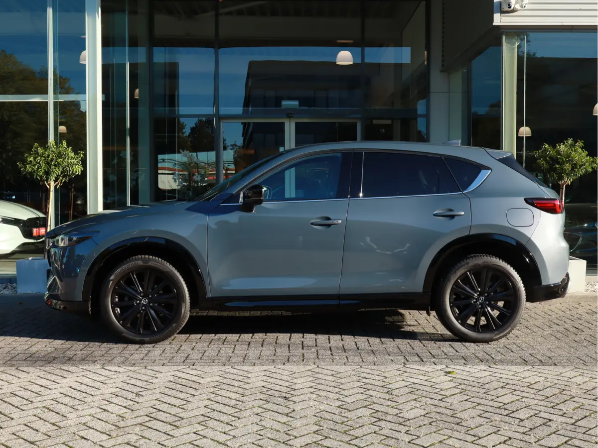2.0 e-SkyActiv-G M Hybrid 165 Homura Leer / Bose / Camera / Navi / Clima / Cruise