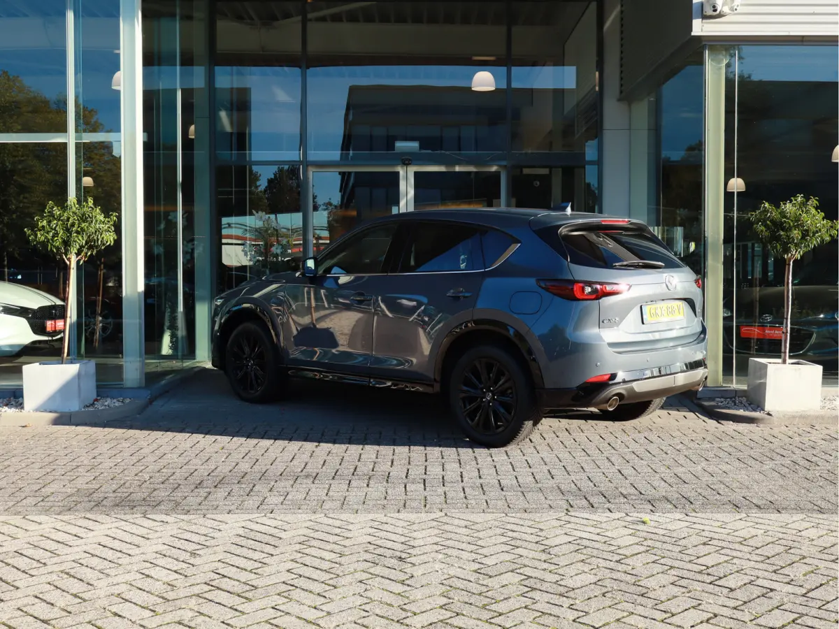 2.0 e-SkyActiv-G M Hybrid 165 Homura Leer / Bose / Camera / Navi / Clima / Cruise