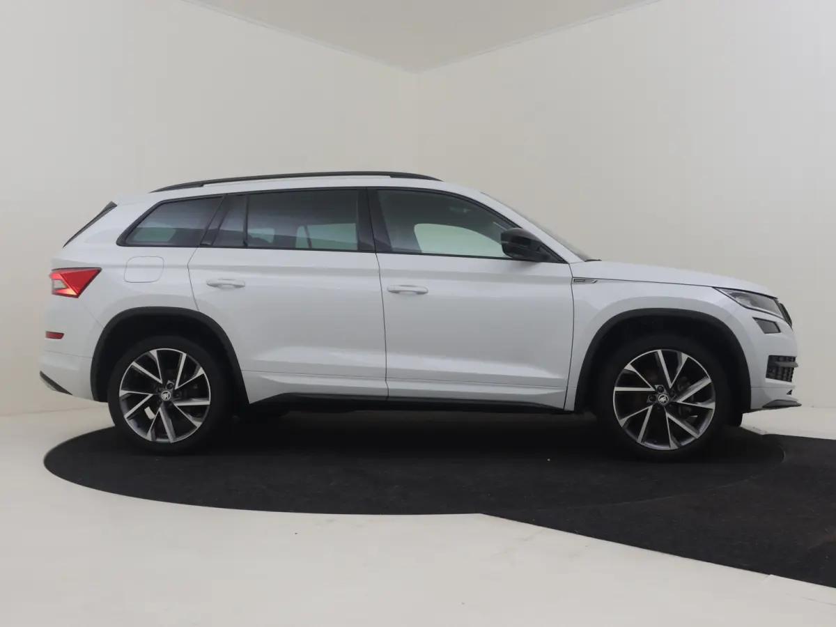 1.5 TSI Sportline Business 7p. l Canton Sound l Elekt. Stoel incl Memory l Side Assist l Elektr. Klep l Panoramadak l Alcantara l Navigatie l