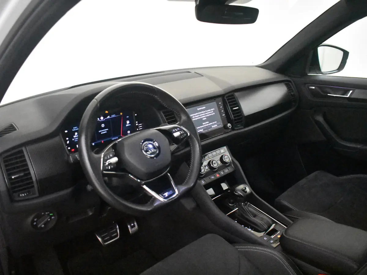 1.5 TSI Sportline Business 7p. l Canton Sound l Elekt. Stoel incl Memory l Side Assist l Elektr. Klep l Panoramadak l Alcantara l Navigatie l