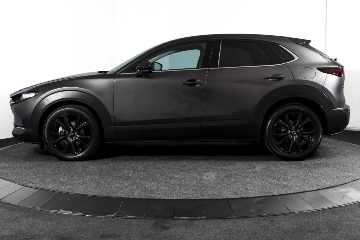 2.0 e-SkyActiv-X 186 PK M Hybrid Nagisa Org. NL. | Adapt. Cruise | Trekhaak | Stoelverw. | PDC | Camera | NAV + App. Connect | ECC | Bose | Elek. Klep | LM 18" |