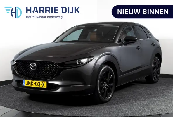 2.0 e-SkyActiv-X 186 PK M Hybrid Nagisa Org. NL. | Adapt. Cruise | Trekhaak | Stoelverw. | PDC | Camera | NAV + App. Connect | ECC | Bose | Elek. Klep | LM 18" |