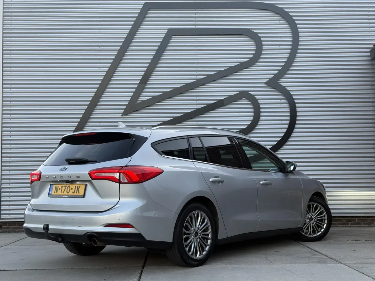 1.0 EcoBoost Titanium Business 2e Eigenaar|Navi|Camera|Trekhaak|Clima|Stoelverwarming|PDC V+A|Carplay|APK tot 04-2027