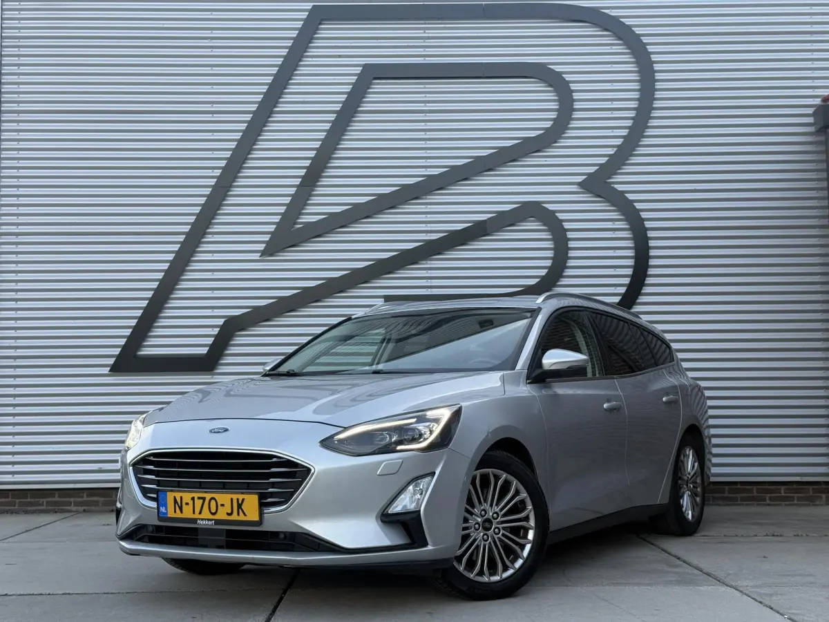 1.0 EcoBoost Titanium Business 2e Eigenaar|Navi|Camera|Trekhaak|Clima|Stoelverwarming|PDC V+A|Carplay|APK tot 04-2027