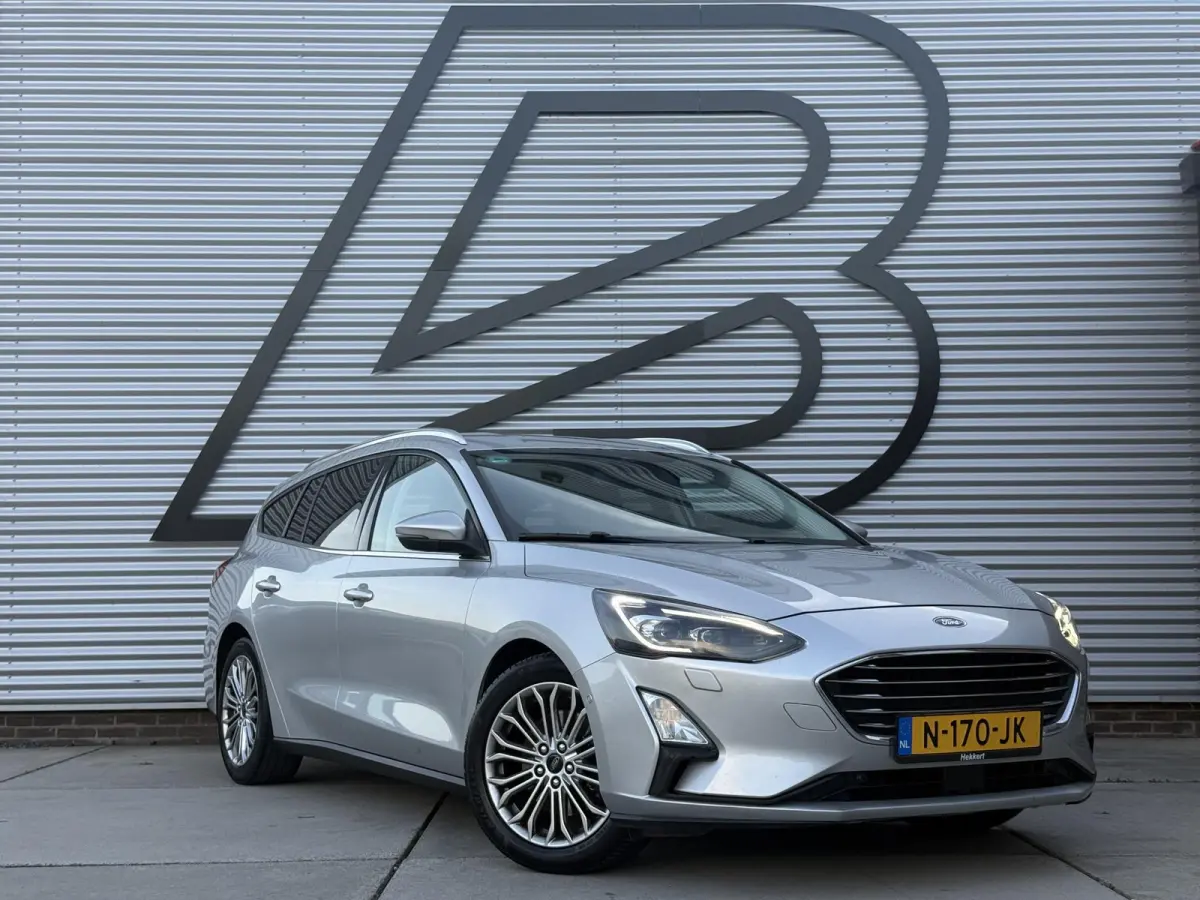 1.0 EcoBoost Titanium Business 2e Eigenaar|Navi|Camera|Trekhaak|Clima|Stoelverwarming|PDC V+A|Carplay|APK tot 04-2027