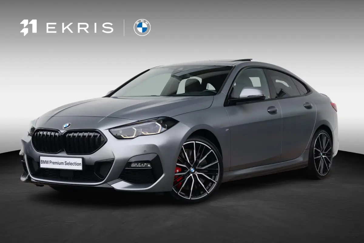 218i | Sport Pakket pro | Panorama Dak | Stuur & Stoelverwarming Voor | Adaptieve Led | Harman Kardon | Frozen Pure Grey |