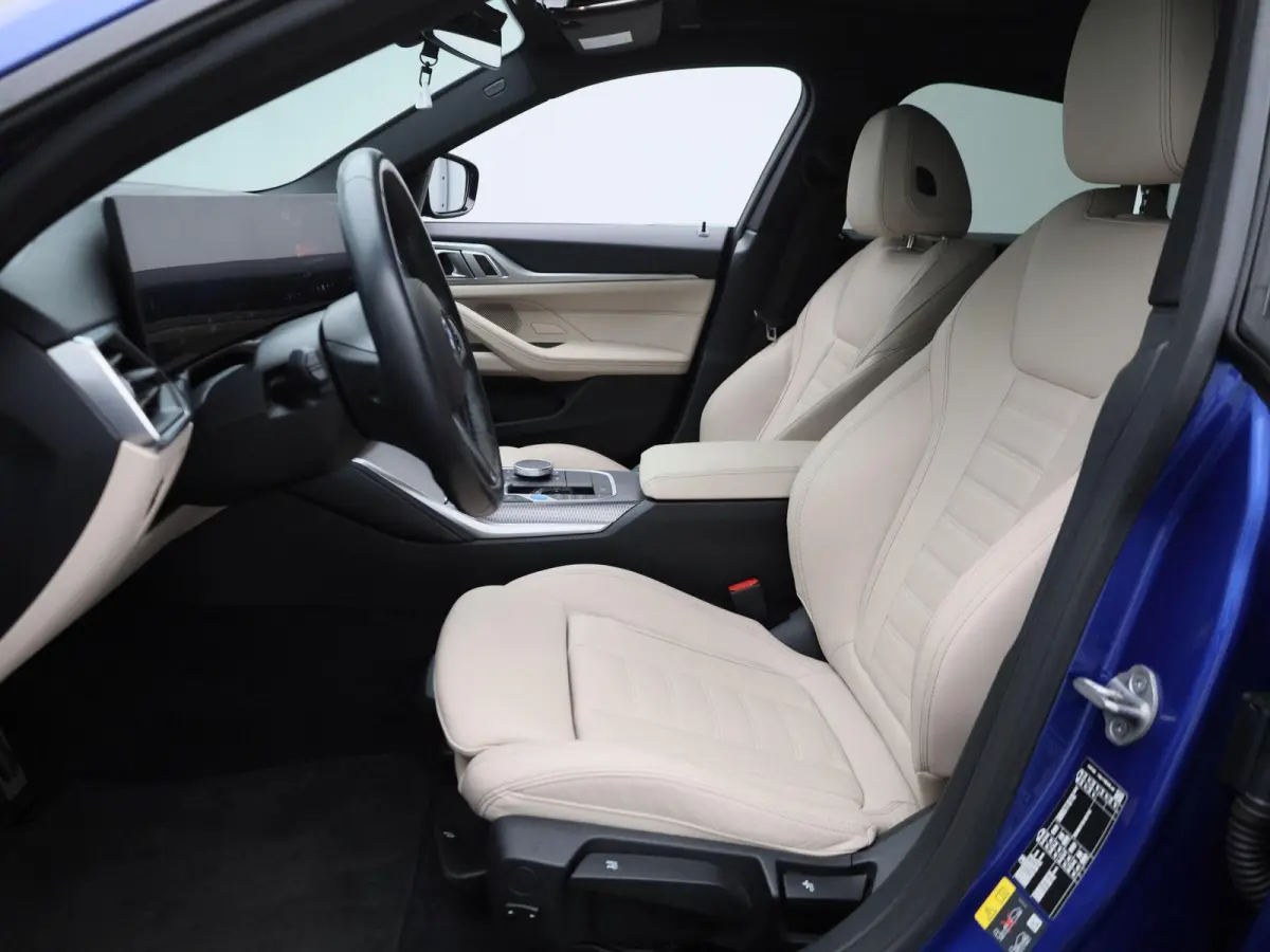 eDrive35 M-Sport 70 kWh | Panoramadak | Oyster Leder | Stoelverwarming | Apple Carplay / Android Auto | Climate Control | Adaptive Cruise Control | Camera | Virtual Cockpit | Lichtmetalen M-