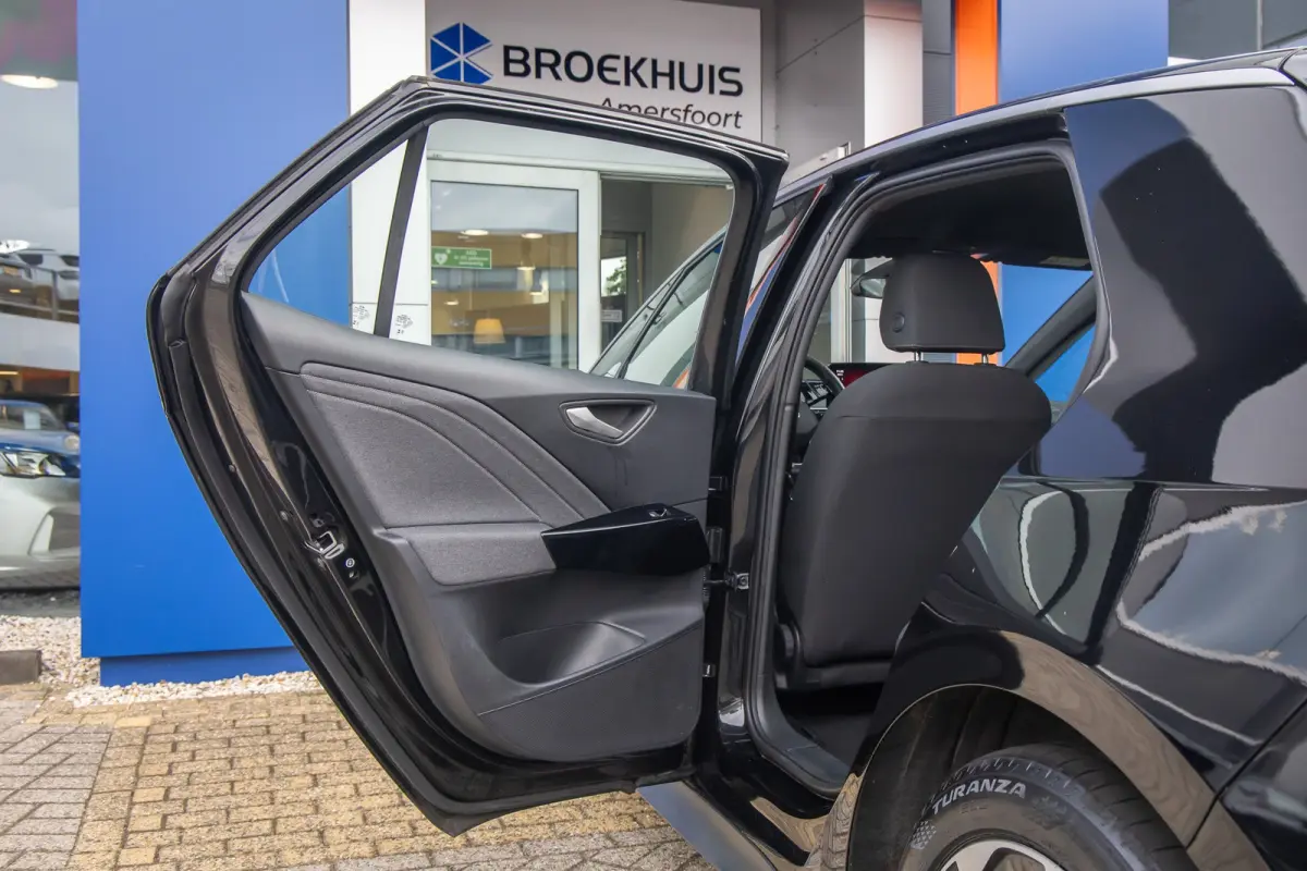 Pro 59 kWh | Apple Carplay/Android Auto | Cruise Control Adaptief | Climate | DAB | Parkeersensoren voor en achter | Airco (automatisch) | Apple Carplay/Android Auto|telefoonintegratie premi