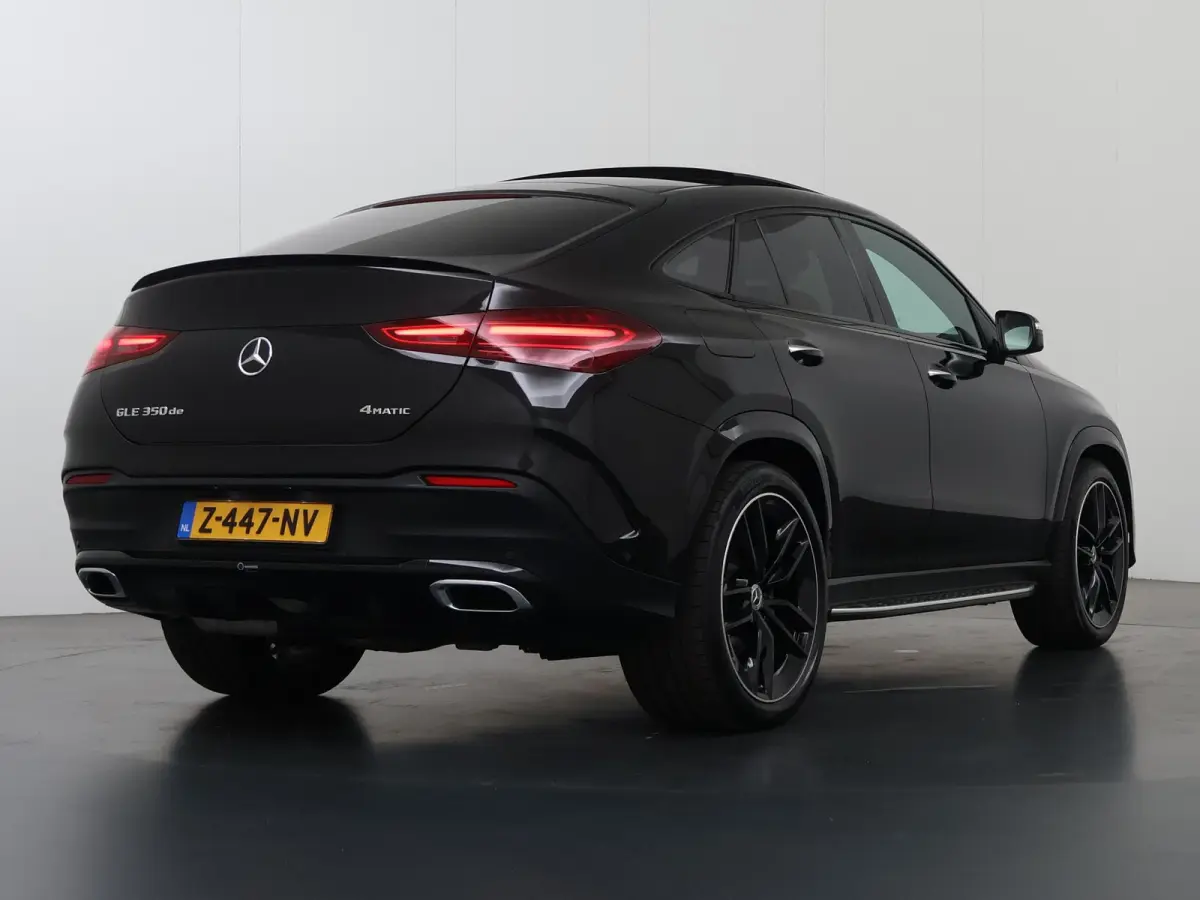 350 de 4MATIC AMG Line Premium Plus | Luchtvering | Night | Panoramadak | Trekhaak | Burmester | Headup | Treeplanken | Zwart leer |