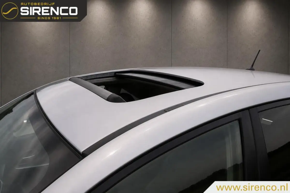 2.0i Premium AWD | leder | stoelverwarming | trekhaak | navigatie | bluetooth | climate & cruise control | keyless