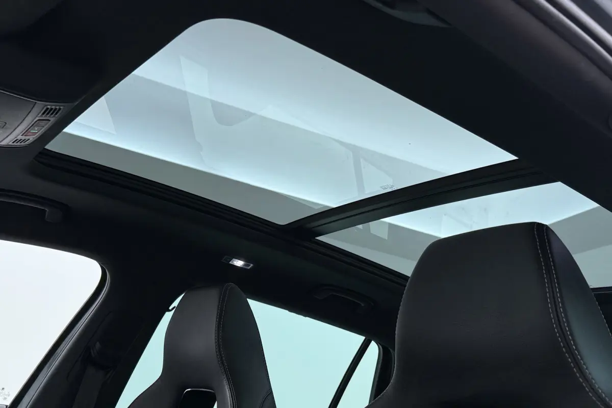 1.5 TSI Sportline Business 7p. | Uitklap Trekhaak | Panoramadak | Stuur-/Stoelverwarming | CarPlay | Camera | Virtual