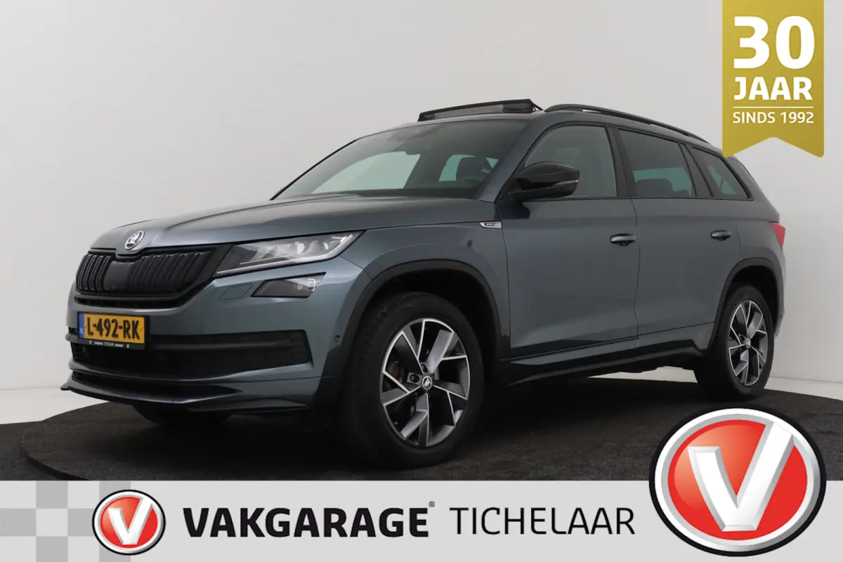 1.5 TSI Sportline Business 7p. | Uitklap Trekhaak | Panoramadak | Stuur-/Stoelverwarming | CarPlay | Camera | Virtual