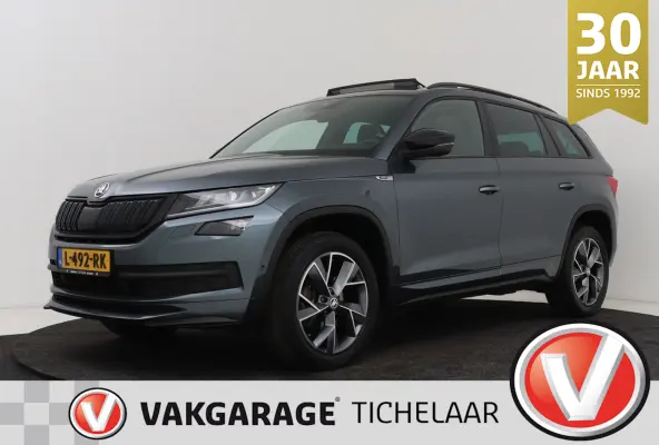 1.5 TSI Sportline Business 7p. | Uitklap Trekhaak | Panoramadak | Stuur-/Stoelverwarming | CarPlay | Camera | Virtual
