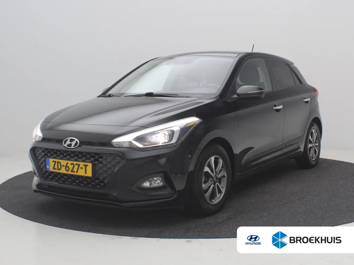1.0 T-GDI Premium | Achterbank in delen neerklapbaar | Achteruitrijcamera | Airco (automatisch)