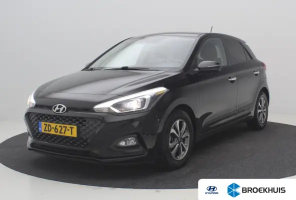 1.0 T-GDI Premium | Achterbank in delen neerklapbaar | Achteruitrijcamera | Airco (automatisch)