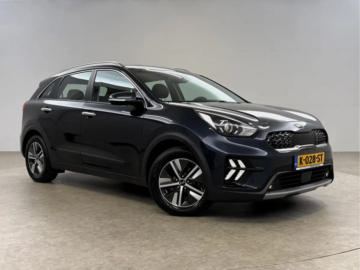 1.6 GDi Hybrid DynamicLine | Camera | Clima | Carplay | Cruise | Trekhaak | Navi | Parkeersens. | NAP