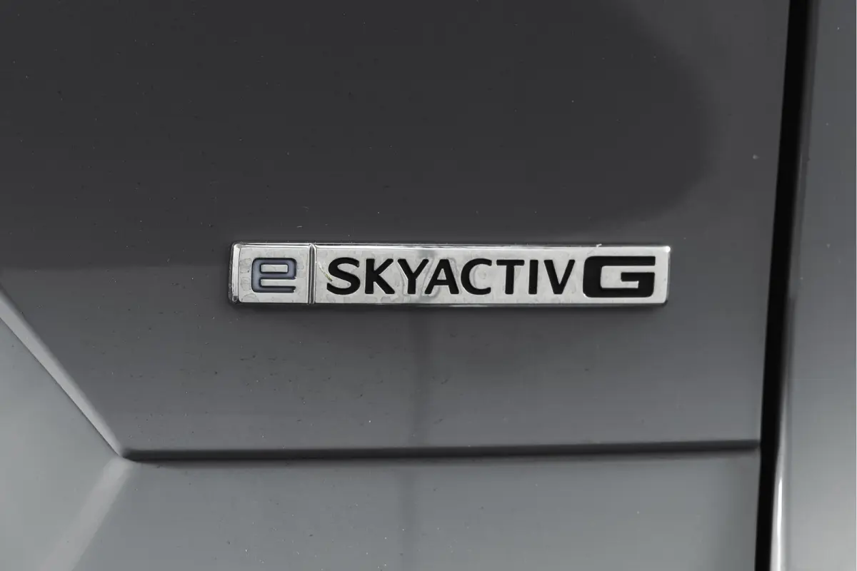 2.5 E-SKYACTIV G 141 M HYBRID Homura | S/K-Panodak | Dig. Cockpit | Adapt. Cruise | Stoelventilatie+verw. | Leder | 360 Camera | NAV + App. Connect | ECC | Elek. Klep | Bose | LM 19" | 2089