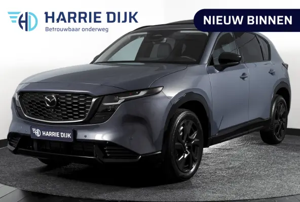 2.5 E-SKYACTIV G 141 M HYBRID Homura | S/K-Panodak | Dig. Cockpit | Adapt. Cruise | Stoelventilatie+verw. | Leder | 360 Camera | NAV + App. Connect | ECC | Elek. Klep | Bose | LM 19" | 0234