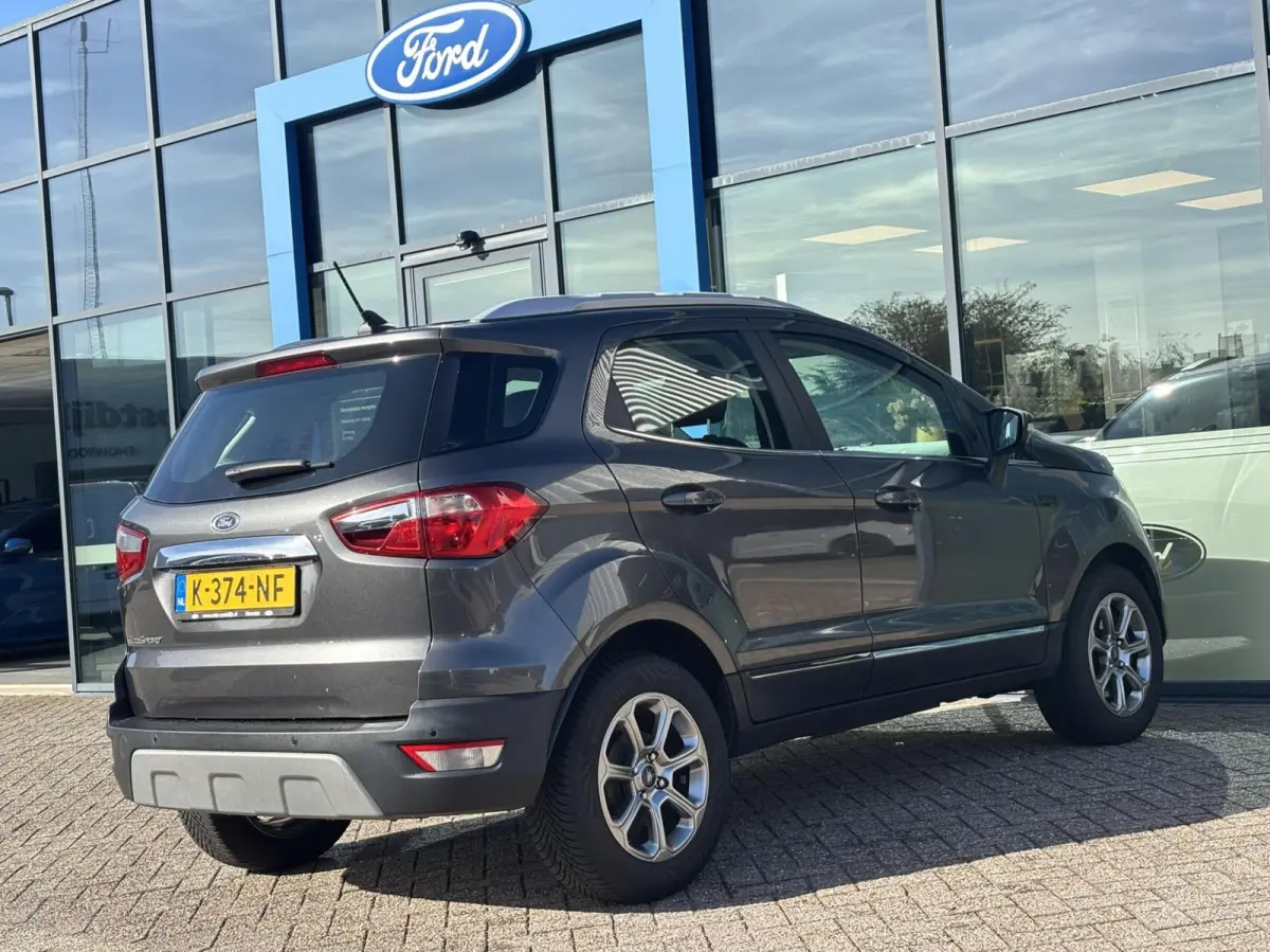 1.0 EcoBoost Titanium 125PK Cruise Navi Climate Parkeersensoren Achter All Season Banden *Leuk*