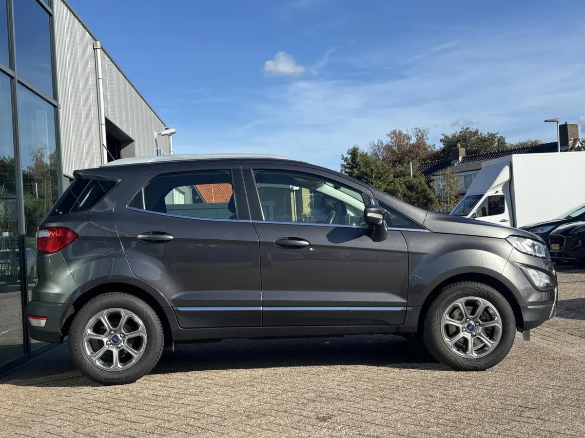 1.0 EcoBoost Titanium 125PK Cruise Navi Climate Parkeersensoren Achter All Season Banden *Leuk*