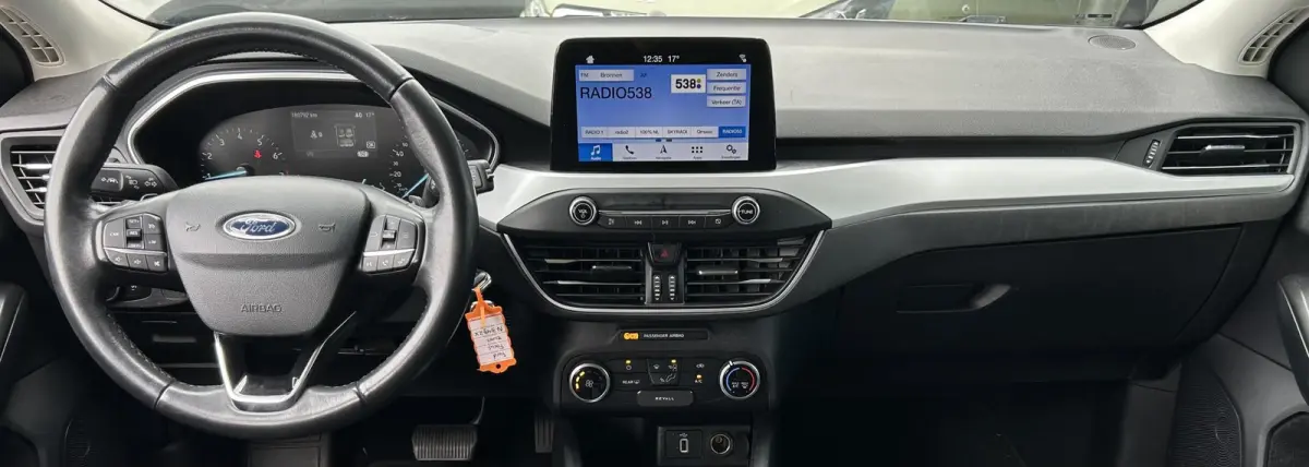 1.0 EcoBoost Titanium Business 125PK | AUTOMAAT | Parkeersensoren voor en achter | Navigatie | Airco | Cruise Control | Bluetooth | Lichtmetalen velgen | 2 sleutels |
