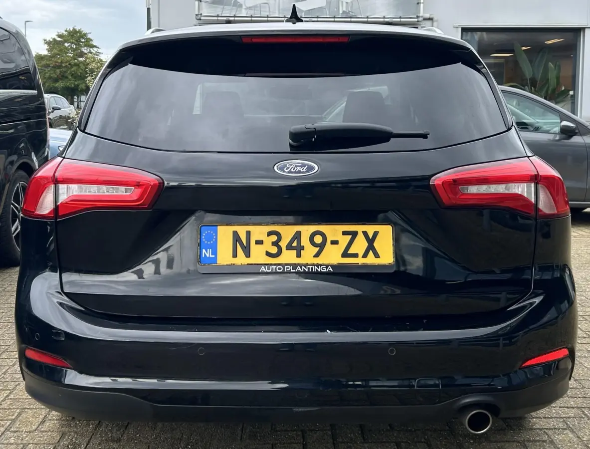 1.0 EcoBoost Titanium Business 125PK | AUTOMAAT | Parkeersensoren voor en achter | Navigatie | Airco | Cruise Control | Bluetooth | Lichtmetalen velgen | 2 sleutels |