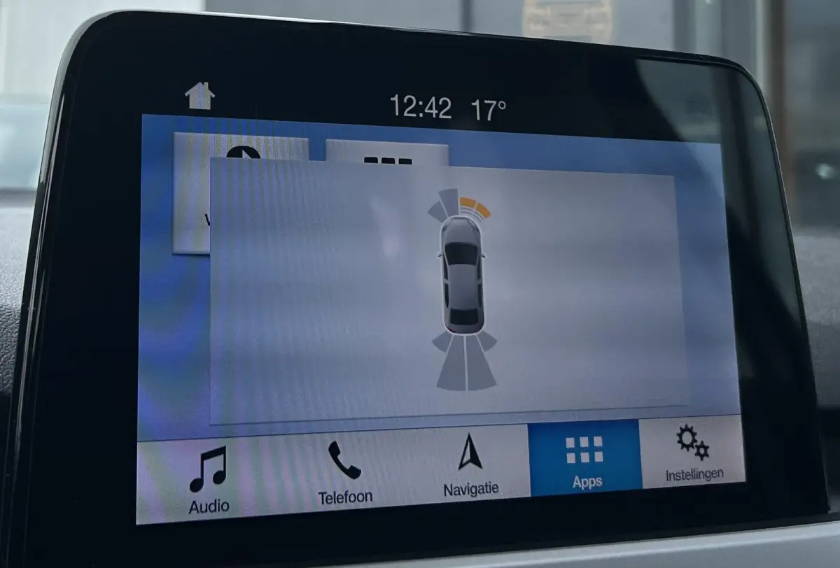 1.0 EcoBoost Titanium Business 125PK | AUTOMAAT | Parkeersensoren voor en achter | Navigatie | Airco | Cruise Control | Bluetooth | Lichtmetalen velgen | 2 sleutels |
