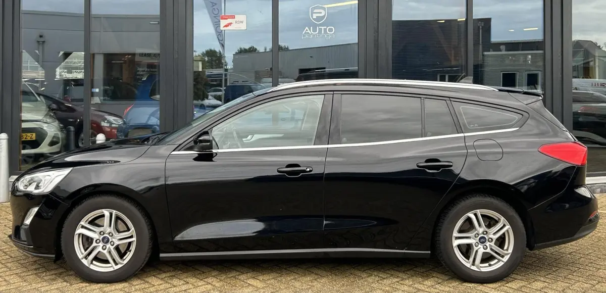 1.0 EcoBoost Titanium Business 125PK | AUTOMAAT | Parkeersensoren voor en achter | Navigatie | Airco | Cruise Control | Bluetooth | Lichtmetalen velgen | 2 sleutels |