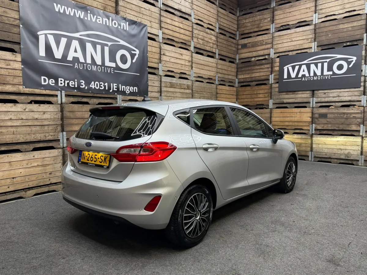 1.0 EcoBoost Titanium Navigatie, Cruise control, 4 seizoenen banden
