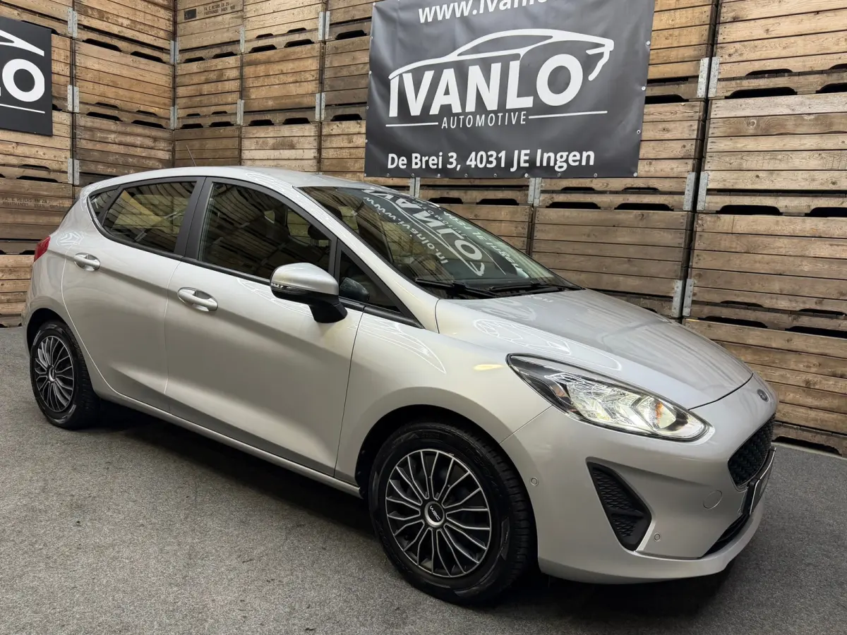 1.0 EcoBoost Titanium Navigatie, Cruise control, 4 seizoenen banden