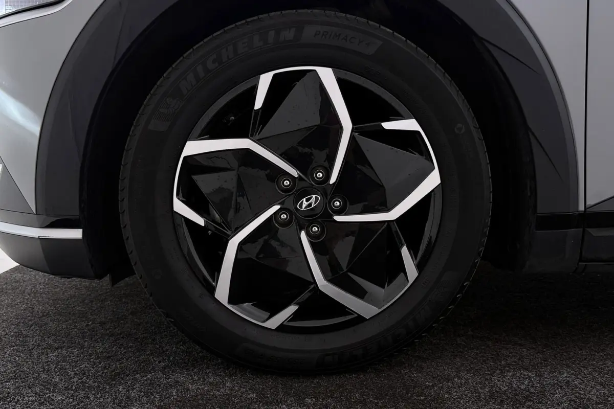 Style 58 kWh | Trekhaak | 96.5% SOH | Camera | CarPlay | Stuur-/Stoelverwarming | Climate Control |