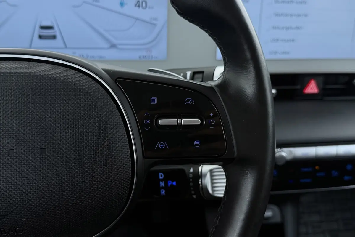 Style 58 kWh | Trekhaak | 96.5% SOH | Camera | CarPlay | Stuur-/Stoelverwarming | Climate Control |