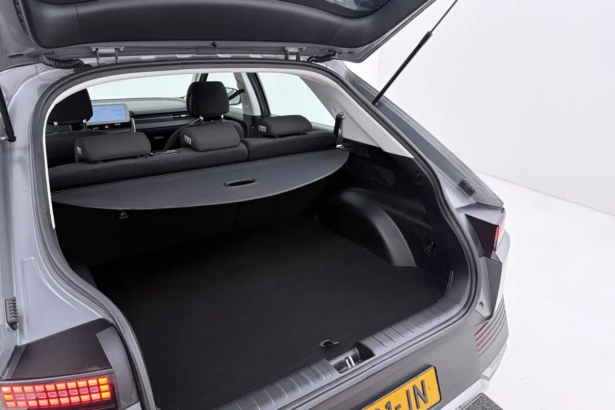 Style 58 kWh | Trekhaak | 96.5% SOH | Camera | CarPlay | Stuur-/Stoelverwarming | Climate Control |