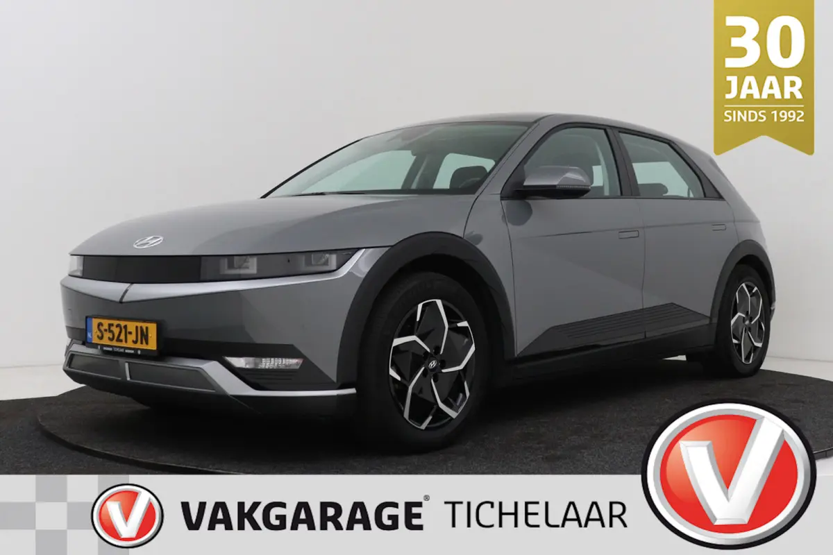 Style 58 kWh | Trekhaak | 96.5% SOH | Camera | CarPlay | Stuur-/Stoelverwarming | Climate Control |