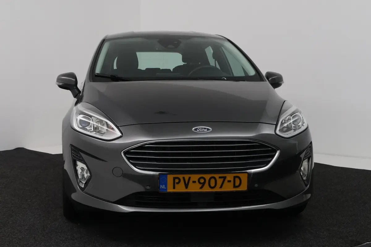 1.0 EcoBoost Titanium (CAMERA, CRUISE CONTROL ADAPTIEF, NAVIGATIE, PARKEERSENSOREN)