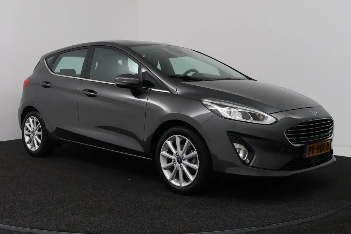1.0 EcoBoost Titanium (CAMERA, CRUISE CONTROL ADAPTIEF, NAVIGATIE, PARKEERSENSOREN)