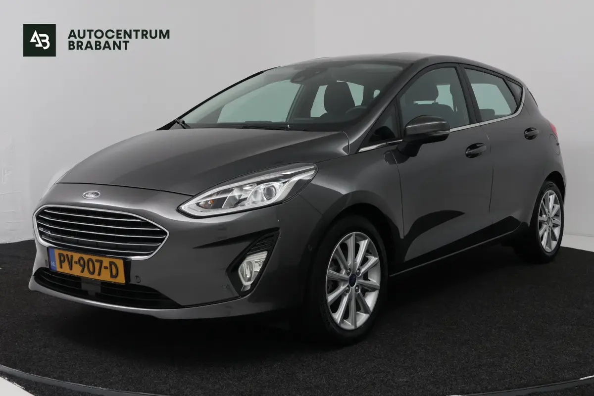 1.0 EcoBoost Titanium (CAMERA, CRUISE CONTROL ADAPTIEF, NAVIGATIE, PARKEERSENSOREN)