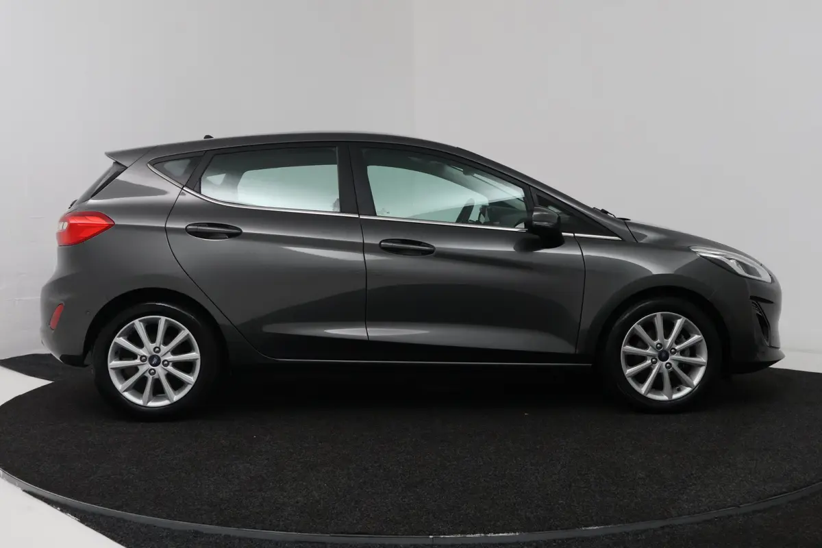 1.0 EcoBoost Titanium (CAMERA, CRUISE CONTROL ADAPTIEF, NAVIGATIE, PARKEERSENSOREN)