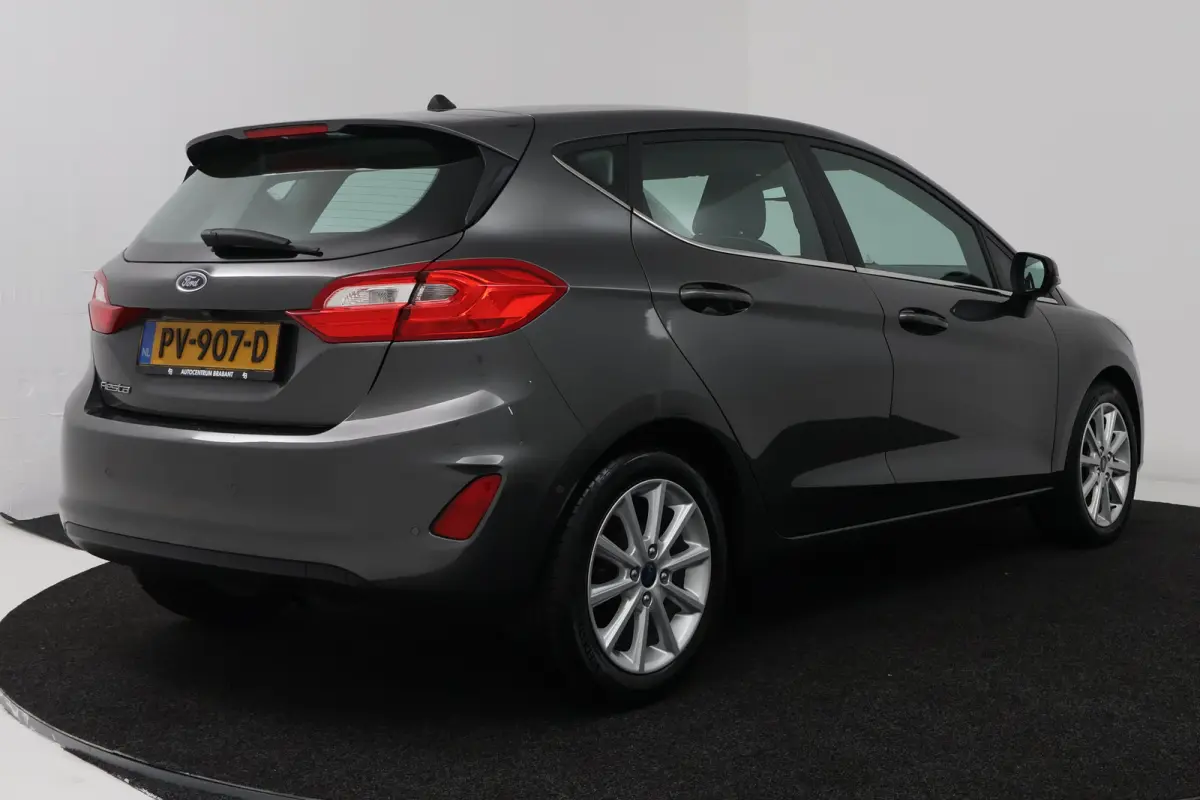 1.0 EcoBoost Titanium (CAMERA, CRUISE CONTROL ADAPTIEF, NAVIGATIE, PARKEERSENSOREN)