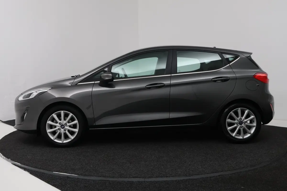 1.0 EcoBoost Titanium (CAMERA, CRUISE CONTROL ADAPTIEF, NAVIGATIE, PARKEERSENSOREN)