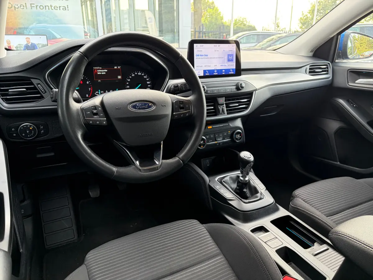 1.0 125 PK Titanium | DEALER ONDERHOUDEN| NAVIGATIE + APPLE CARPLAY/ANDROID AUTO| KEYLESS ENTRY & START| FULL LED| PARKEERSENSOREN V+A| CLIMATE CONTROL| DAB| CRUISE CONTROL|
