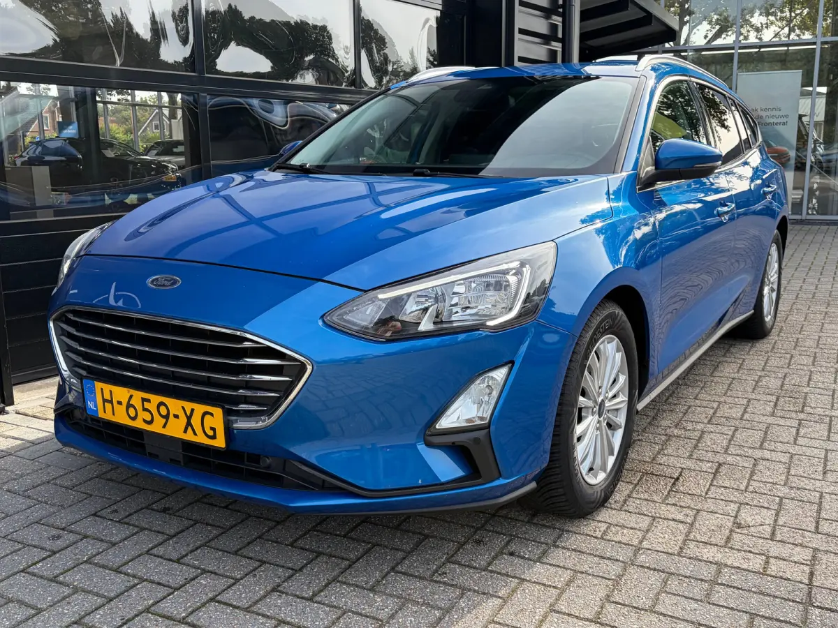 1.0 125 PK Titanium | DEALER ONDERHOUDEN| NAVIGATIE + APPLE CARPLAY/ANDROID AUTO| KEYLESS ENTRY & START| FULL LED| PARKEERSENSOREN V+A| CLIMATE CONTROL| DAB| CRUISE CONTROL|
