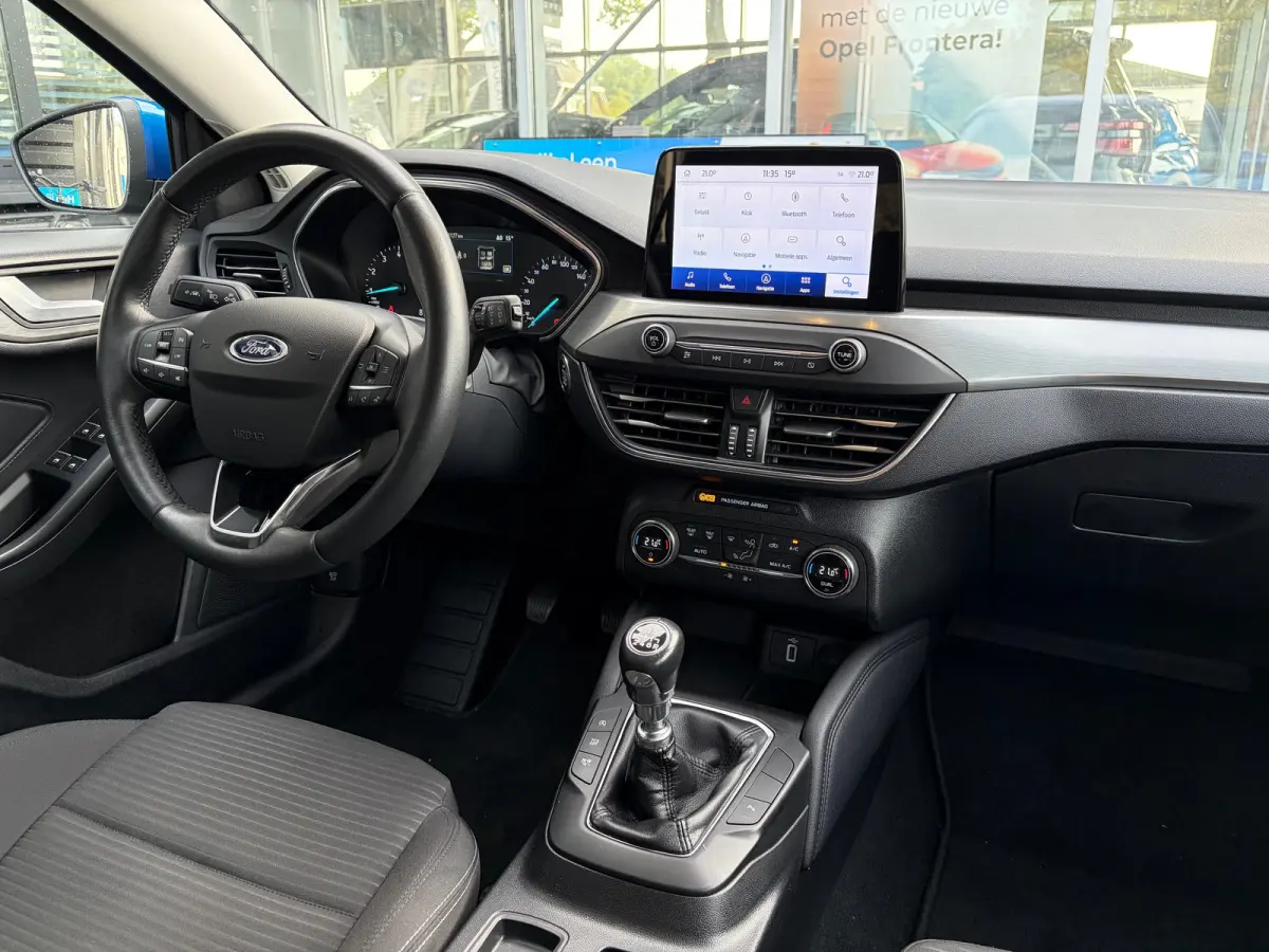 1.0 125 PK Titanium | DEALER ONDERHOUDEN| NAVIGATIE + APPLE CARPLAY/ANDROID AUTO| KEYLESS ENTRY & START| FULL LED| PARKEERSENSOREN V+A| CLIMATE CONTROL| DAB| CRUISE CONTROL|