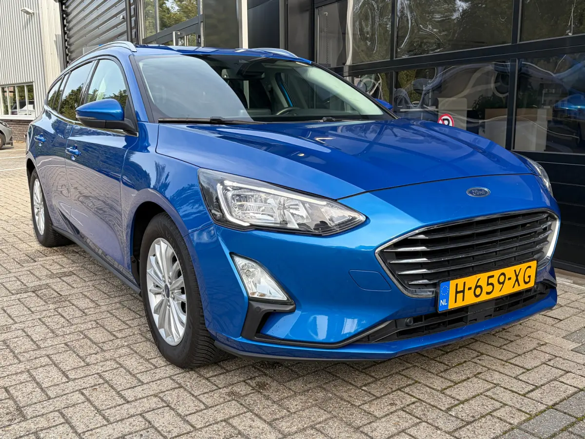 1.0 125 PK Titanium | DEALER ONDERHOUDEN| NAVIGATIE + APPLE CARPLAY/ANDROID AUTO| KEYLESS ENTRY & START| FULL LED| PARKEERSENSOREN V+A| CLIMATE CONTROL| DAB| CRUISE CONTROL|