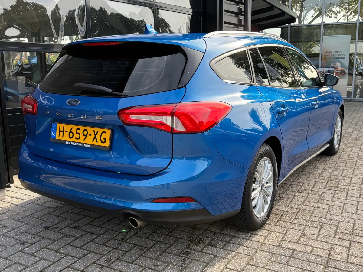 1.0 125 PK Titanium | DEALER ONDERHOUDEN| NAVIGATIE + APPLE CARPLAY/ANDROID AUTO| KEYLESS ENTRY & START| FULL LED| PARKEERSENSOREN V+A| CLIMATE CONTROL| DAB| CRUISE CONTROL|