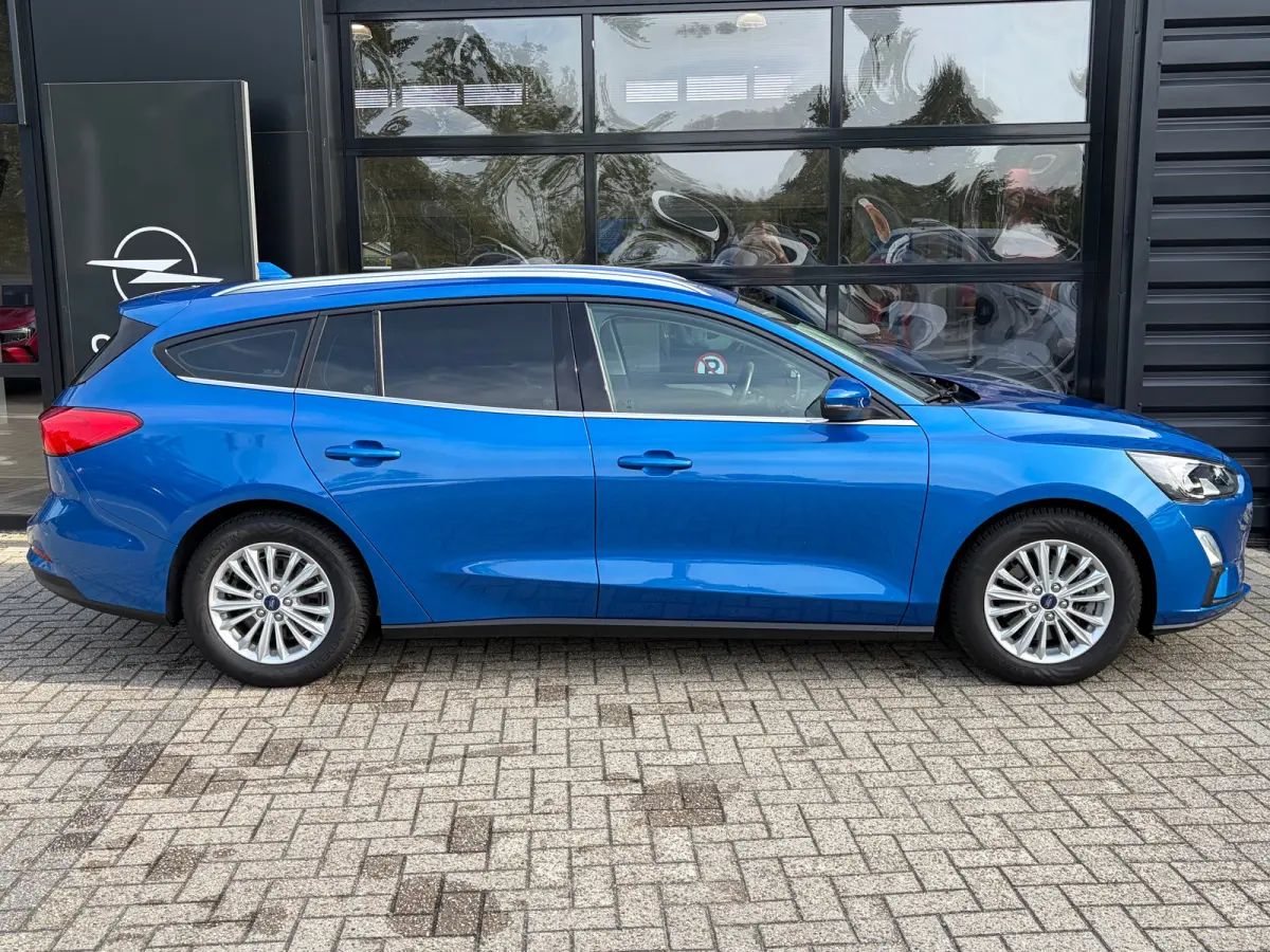 1.0 125 PK Titanium | DEALER ONDERHOUDEN| NAVIGATIE + APPLE CARPLAY/ANDROID AUTO| KEYLESS ENTRY & START| FULL LED| PARKEERSENSOREN V+A| CLIMATE CONTROL| DAB| CRUISE CONTROL|